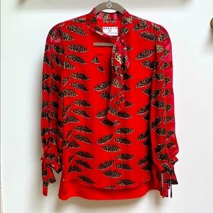 Like new Alice & Olivia blouse.